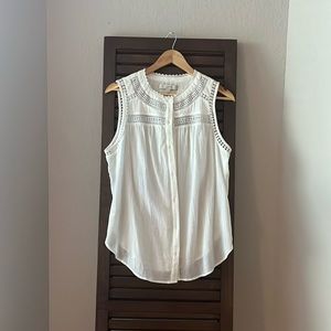 White, sleeveless, eyelet lace blouse by Loft. Size medium.